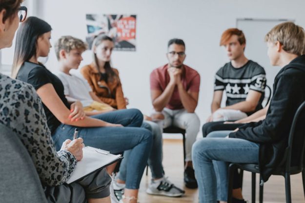 group learning about addiction science