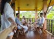 At mental health treatment in tampa bay a woman leads a person towards a group taking part in mental health counseling in tampa as she discusses mental health treatment in florida and dual diagnosis treatment in tampa florida