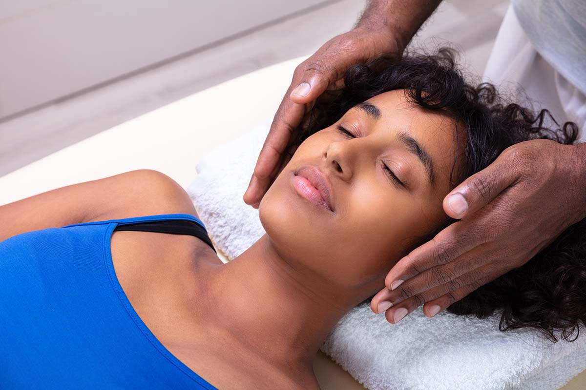 woman experiencing benefits of holistic therapy